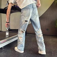 Ripped jeans with big holes on the back for men 2025 summer vacation wear new beggar pants loose flared wide-leg pants
