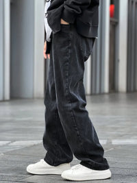 A top choice for autumn and winter transitions! Loose black men's jeans with inherent warmth, comfortable and versatile, suitabl